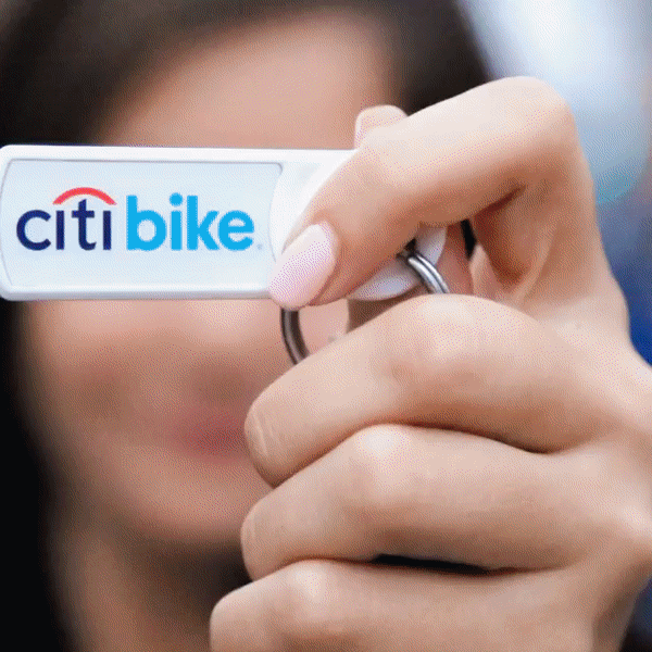 A rapidly scrolling gif, showing different photos of Citi Bike throughout the years. 