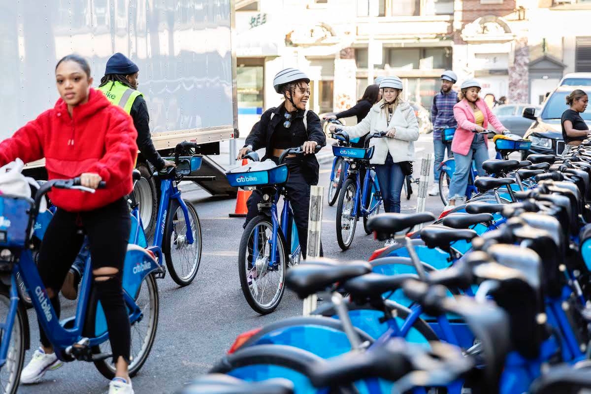 A group of people lining up for a group ride